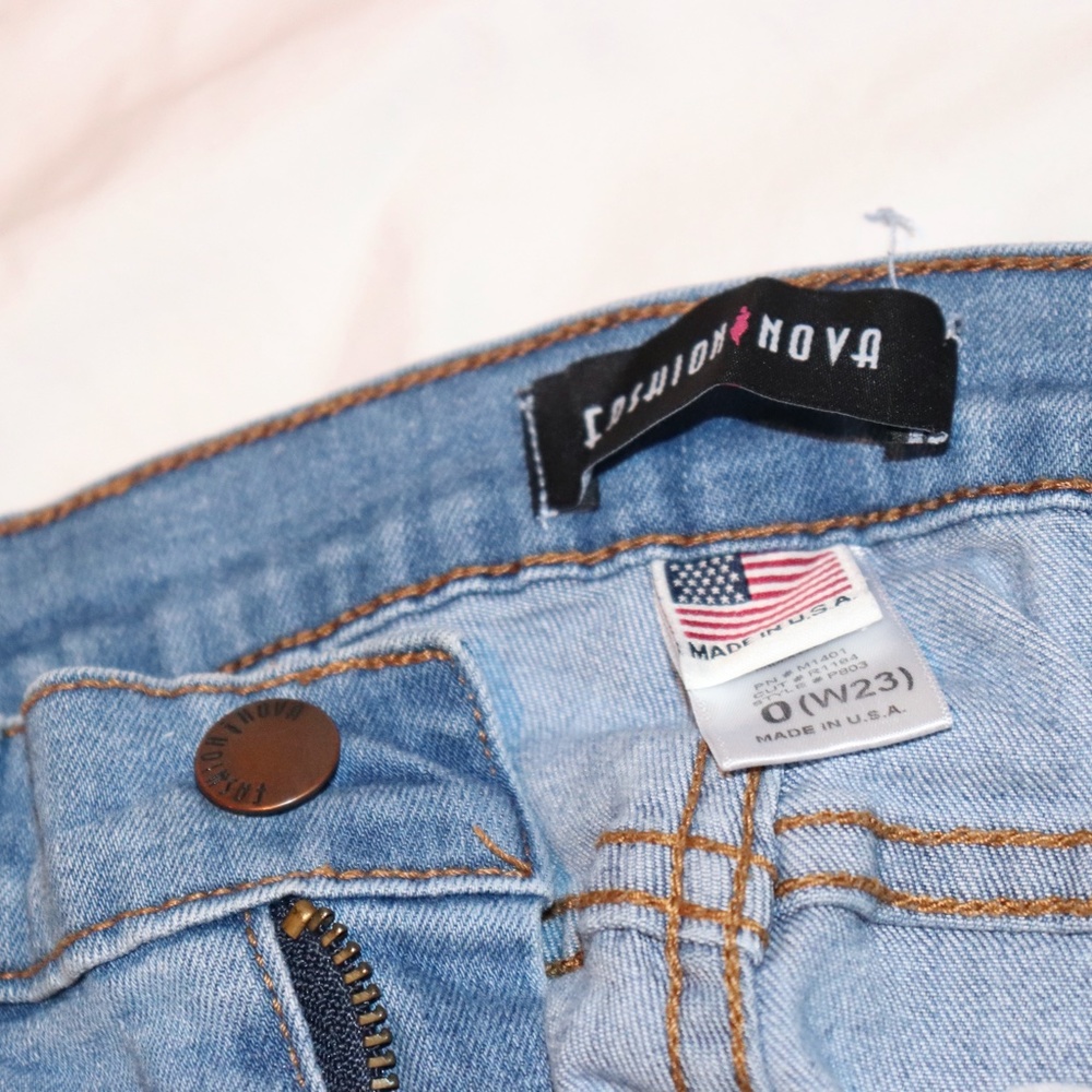 Light Wash Ripped Jeans - Picture 3 of 6